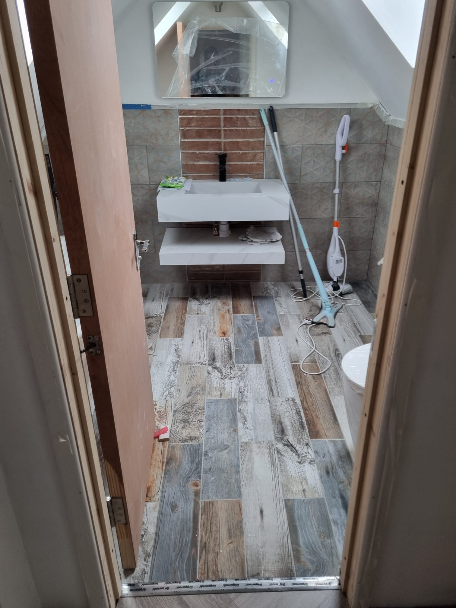 Bathroom tiling in a loft conversion